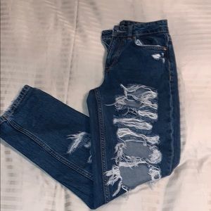 Medium wasted ripped dark wash boyfriend jeans